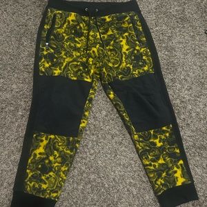 The North Face “RACE” fleece pants